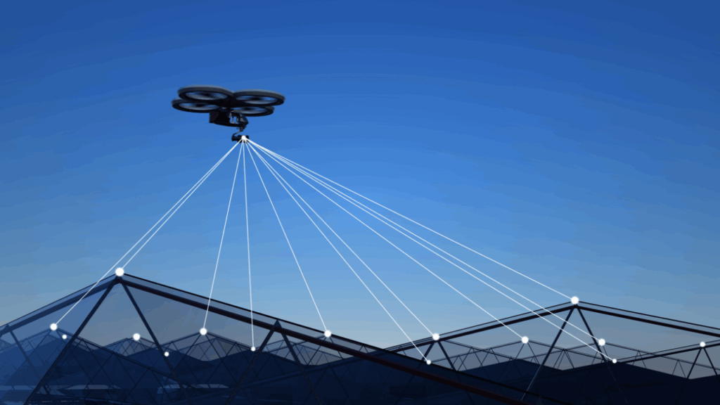 Drone capturing overlapping images of building structure with white dots showing photogrammetry measurement points and data collection process
